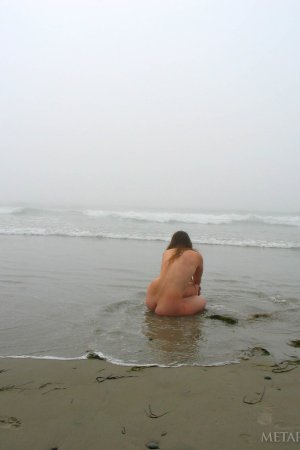 Getting close to the nature while nude photo 4