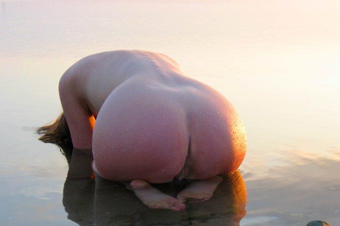 Getting close to the nature while nude photo 8