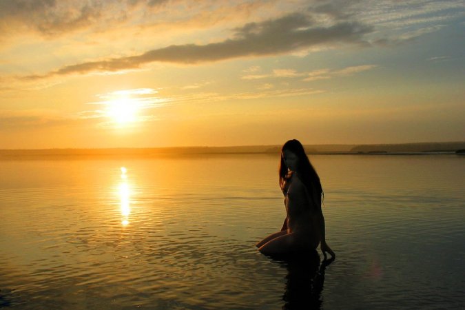 Getting close to the nature while nude photo 12