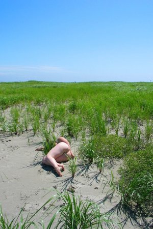 Getting close to the nature while nude photo 16