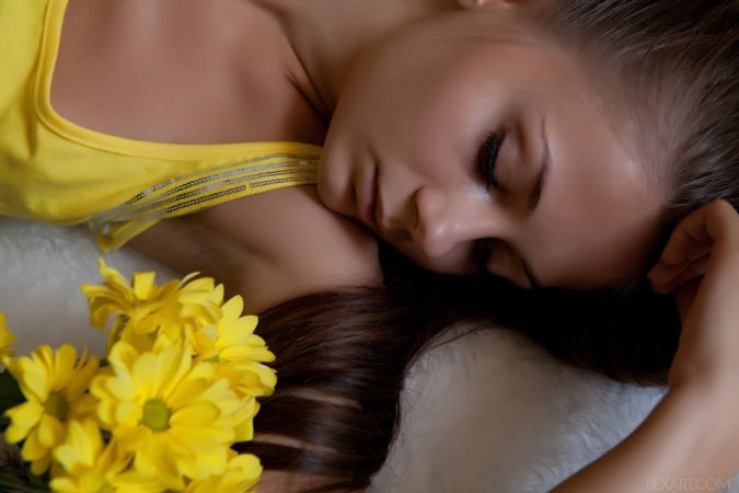 This chick loves flowers so much photo 2