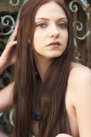 Cute brunette posing in sexy boots photo 7