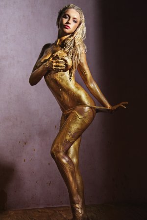 Covered in gold a blonde is artistically naked photo 13