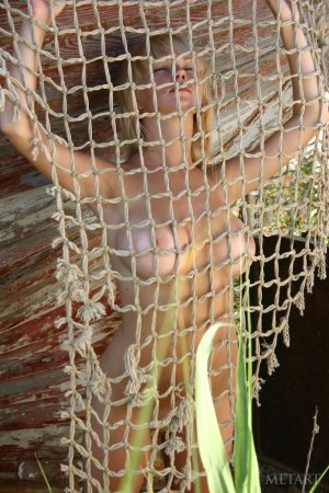 Blonde is showing us her tan lines photo 11