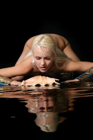 Gentle blonde enjoys hot sun on her skin. photo 9