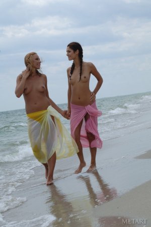Naked lesbians orgasm together in a waves photo 12