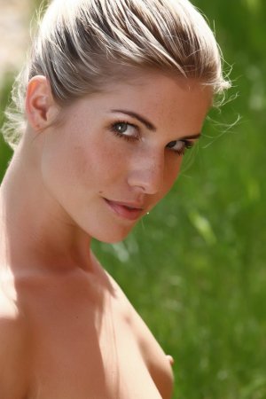 Fantastic model gets naked while modeling outside photo 9