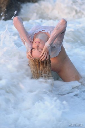 Playing naked in the surf looks like fun photo 16