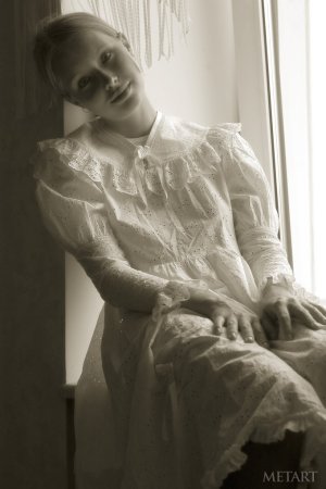 Blonde girl in a black and white posing scene photo 2