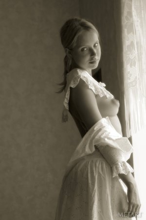 Blonde girl in a black and white posing scene photo 3