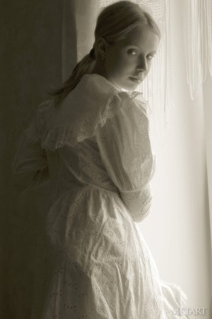 Blonde girl in a black and white posing scene photo 4