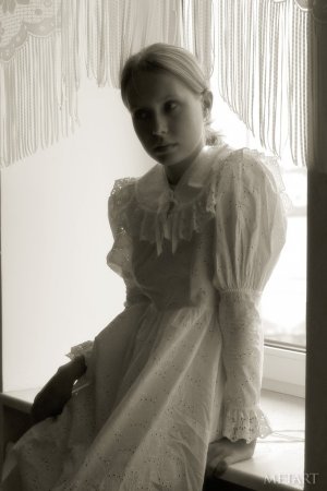 Blonde girl in a black and white posing scene photo 8