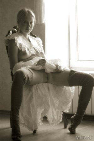 Blonde girl in a black and white posing scene photo 16