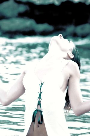 Having some wet, naked fun in the river. photo 3