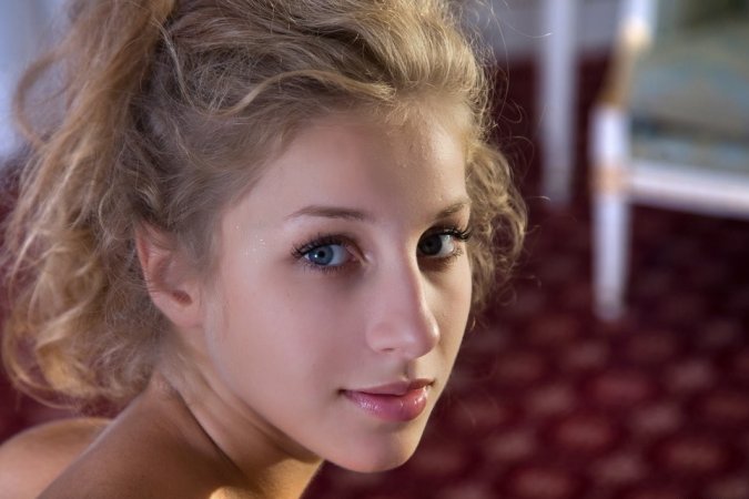 Adorable blonde chick showing her assets photo 7