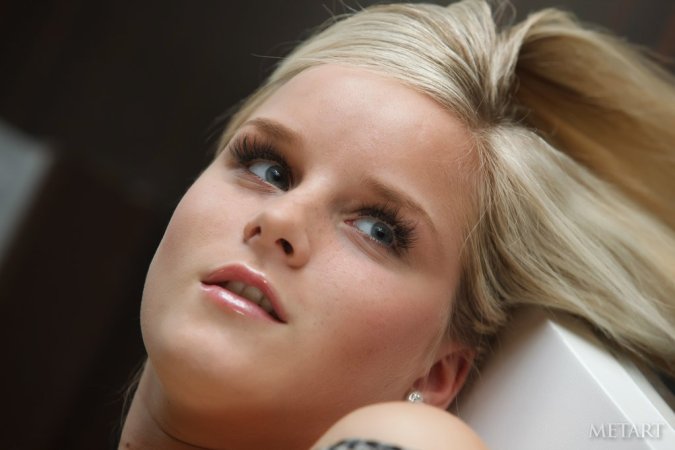 Appetizing blonde gazing into tiny air while exposing photo 10