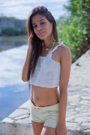 Hottie undresses right in the middle of the street photo 10