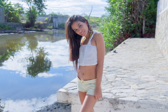 Hottie undresses right in the middle of the street photo 13