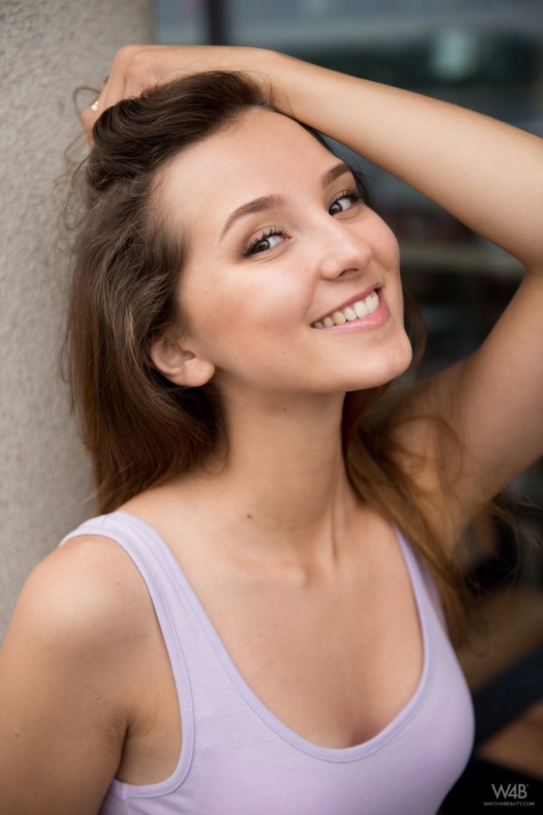 Milana – Hot chick performs an outdoor striptease