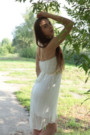 Naked cutie relaxes under warm sun photo 6