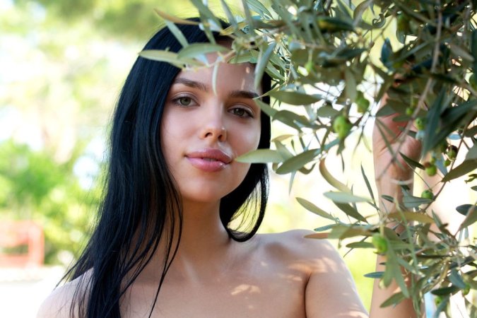 Dark-haired cutie orgasms on a private sex picnic photo 1