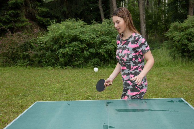 Chick orgasms on an outdoor table tennis photo 12