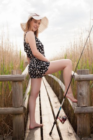 Sweetie goes fishing totally naked photo 8
