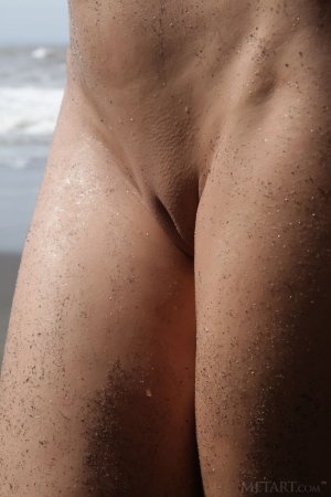 Hottie comes to the beach to get satisfaction photo 5