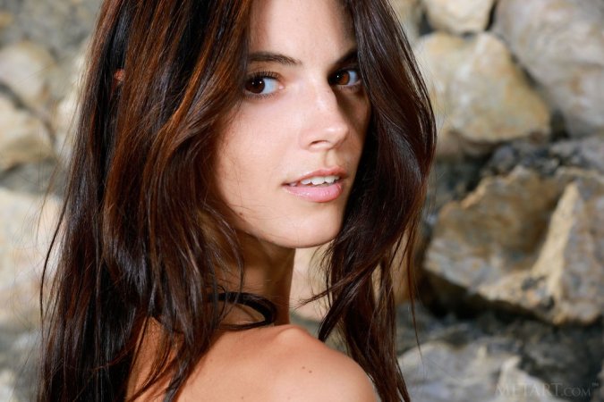 Dark-haired chick poses totally naked outdoors photo 10