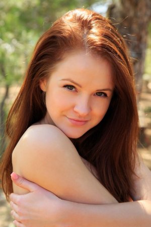 Brunette gets a bright orgasm in forest photo 5