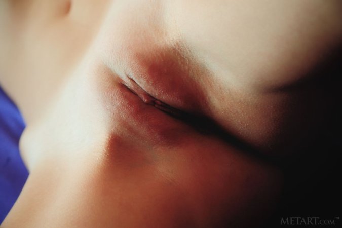 Cutie enjoys a solo sex action in her bed photo 6