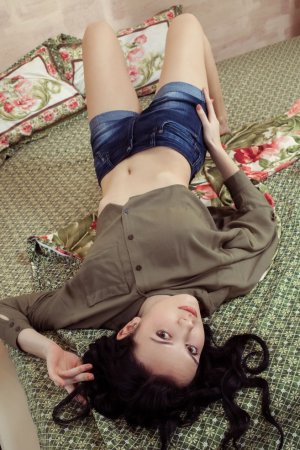 Cutie puts on tiny jeans shorts photo 19