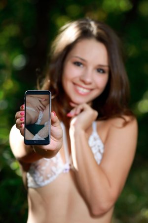 Hottie makes close-up pictures of her pussy photo 16