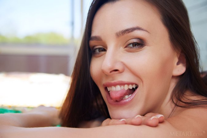 Bored brunette teases her pink clit on floor photo 3