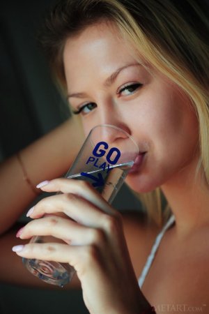 Gorgeous blonde orgasms in her armchair photo 14