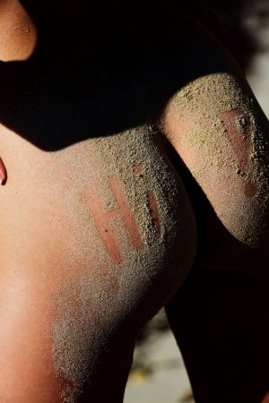 Hot chick warms her hot body under hot sun photo 16