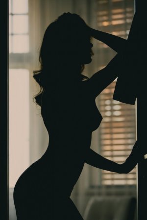Naked lady entertains herself with a couple of orgasms photo 5