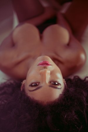 Curly brunette spends day totally naked photo 11
