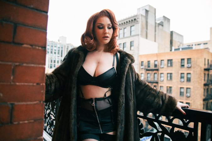 Skye Blue in black lingerie and fur coat photo 1